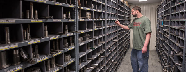 Worker in tool room at Embassy Metals