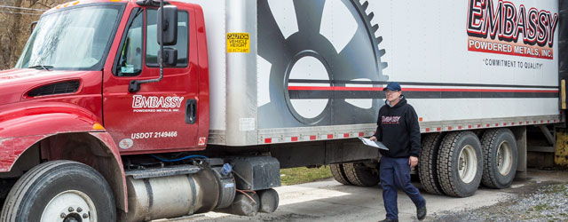 Embassy delivery truck at loading dock ready to begin deliveries